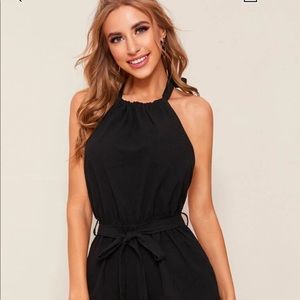 Never worn open back romper